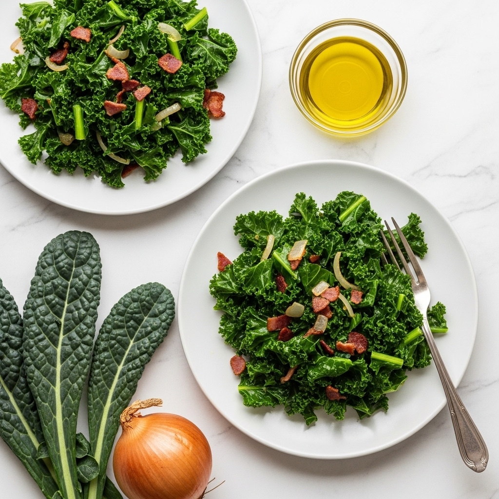 The image shows a dark gray plate filled with cooked kale mixed with small bits of onion and bacon, all piled in a loose mound with a fork resting on the right edge of the plate. Above the plate, there is a clear round glass bowl filled with golden olive oil. To the left of the plate on a white marbled surface, there is a fresh curly kale leaf and an unpeeled yellow onion. Another similar dark gray plate with the same kale dish is partially visible in the top left corner. The overall scene is lit softly with a clean, simple look. Photo taken with an iphone --ar 4:5 --v 7