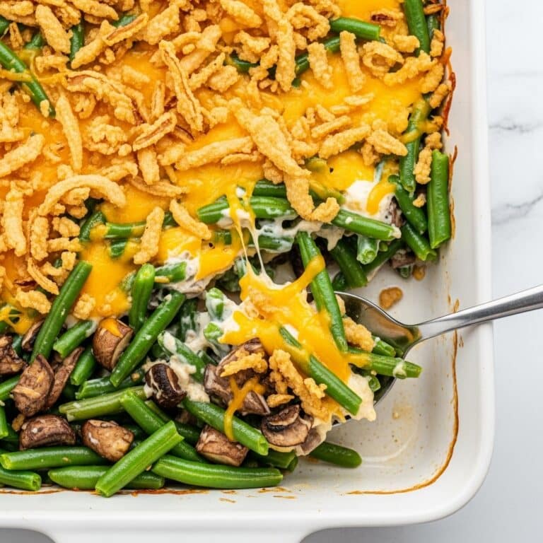 Creamy Green Bean Casserole with Mushrooms, Cheddar, and Crispy Fried Onions Recipe