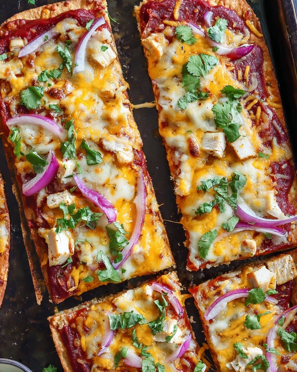 The image shows four rectangular slices of pizza placed closely on a dark baking tray. Each slice has a base layer of golden-brown crust topped with a smooth, dark red tomato sauce, followed by a layer of melted orange cheddar cheese. On top, there are chunks of white grilled chicken, thin slices of purple-red onion, and fresh green cilantro leaves scattered evenly. The pizza looks hot and cheesy, with a slightly crispy crust edge visible. Photo taken with an iphone --ar 4:5 --v 7